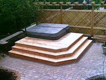hot tub deck on paver patio