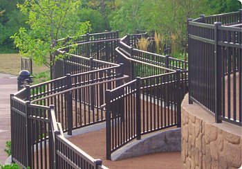 aluminum deck railing on a masonry wall