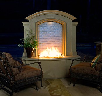 outdoor fireplace with chairs