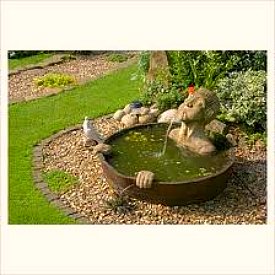 Man in a Barrel Water Feature